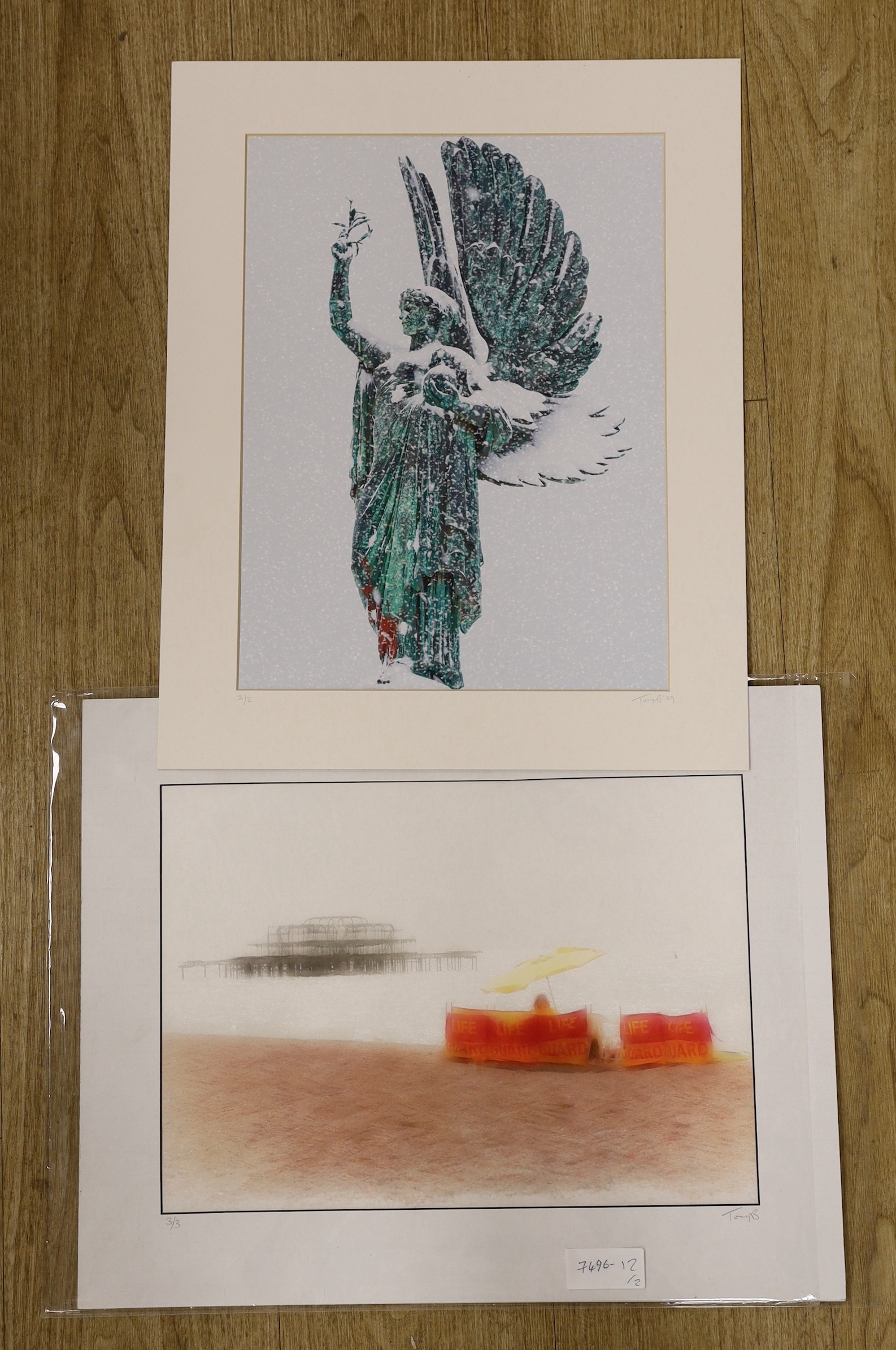 Tony Bowall FRPS, two limited edition prints, Statue in the snow and West Pier, Brighton, signed, 39 x 29cm and 28 x 39cm, unframed